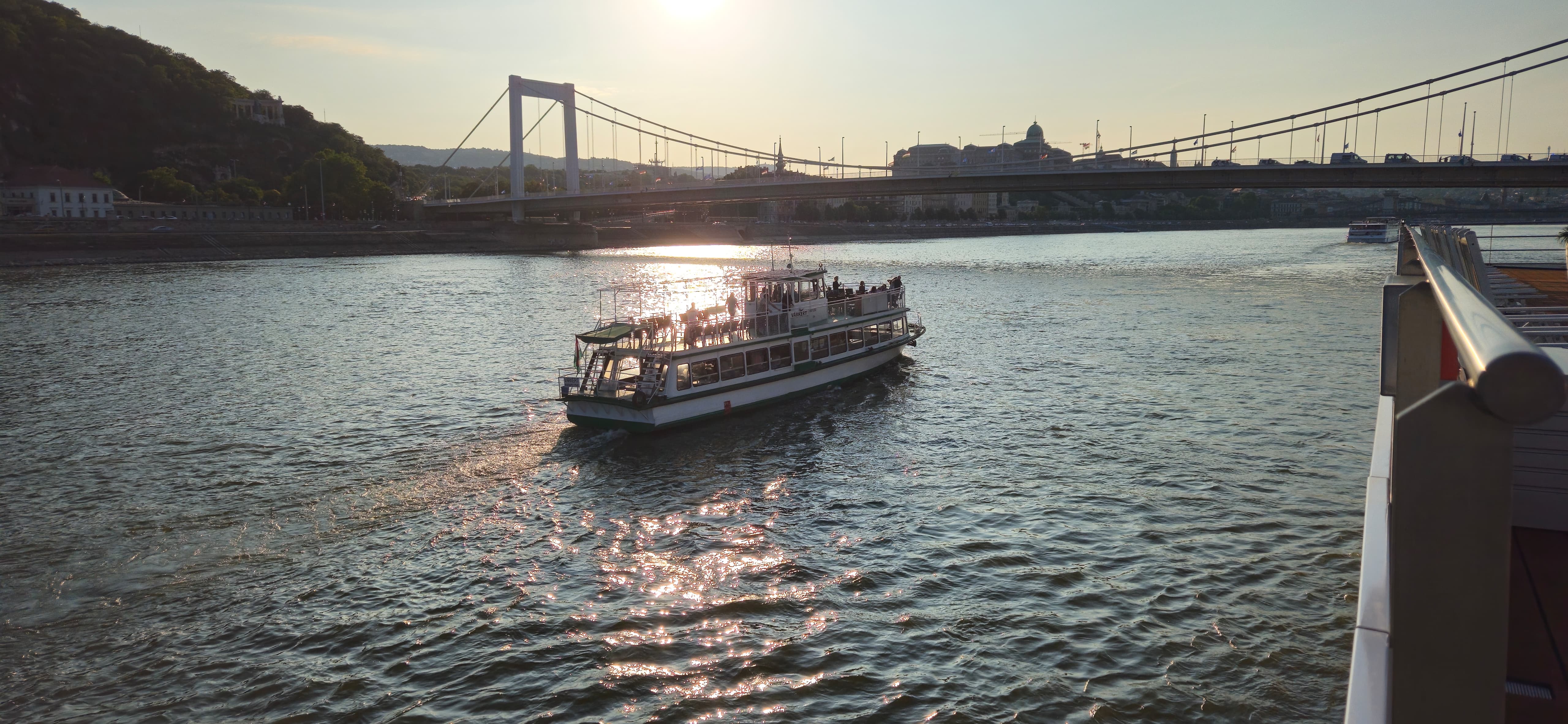 Our boat sailing on the Danube at sunset with the Elisabeth Bridge in the background.